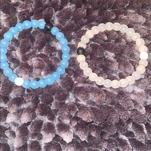 2 Lokai bracelets